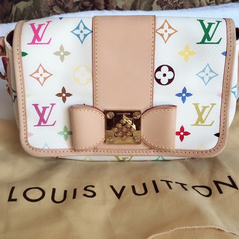 💯% LV clutch